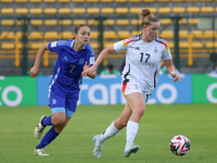 Alara Sehitler of Germany and Delfina Lombardi of Argentina fight for the ball during the 2024 FIFA U-20 Women's World Cup match between Ger...