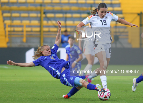 Loreen Bender of Germany and Juana Cangaro of Argentina fight for the ball during the 2024 FIFA U-20 Women's World Cup match between Germany...