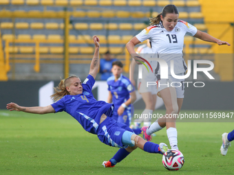 Loreen Bender of Germany and Juana Cangaro of Argentina fight for the ball during the 2024 FIFA U-20 Women's World Cup match between Germany...