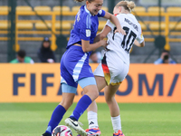 Sophie Nachtigall of Germany and Delfina Lombardi of Argentina fight for the ball during the FIFA U-20 Women's World Cup 2024 match between...