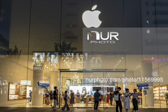 People buy Apple products at an Apple product store in Changsha, China, on September 11, 2024. According to the relevant page of Apple's off...