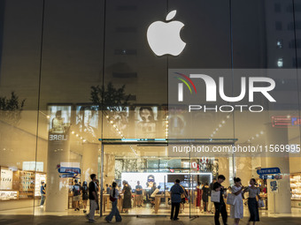 People buy Apple products at an Apple product store in Changsha, China, on September 11, 2024. According to the relevant page of Apple's off...