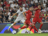 Arnor Ingvi Traustason  and Merih Demiral  during the UEFA Nations League 2024/25 League B Group B4 match between Turkiye and Iceland at Gür...