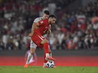 Johann Gudmundsson of Iceland and Orkun Kokcu of Turkey   during the UEFA Nations League 2024/25 League B Group B4 match between Turkiye and...