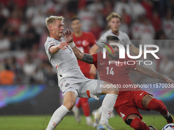 Abdulkerim Bardakci of Turkey and Orri Oskarsson of Iceland   during the UEFA Nations League 2024/25 League B Group B4 match between Turkiye...