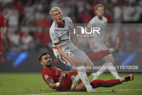 Abdulkerim Bardakci of Turkey and Orri Oskarsson of Iceland   during the UEFA Nations League 2024/25 League B Group B4 match between Turkiye...