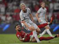 Abdulkerim Bardakci of Turkey and Orri Oskarsson of Iceland   during the UEFA Nations League 2024/25 League B Group B4 match between Turkiye...