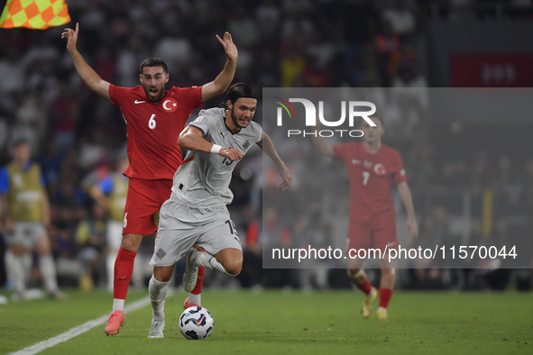 Willum Thor Willumsson of Iceland and Orkun Kokcu of Turkey   during the UEFA Nations League 2024/25 League B Group B4 match between Turkiye...