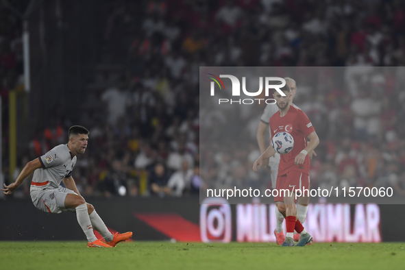 Ismail Yuksek of Turkey and Johann Gudmundsson of Iceland   during the UEFA Nations League 2024/25 League B Group B4 match between Turkiye a...