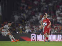 Ismail Yuksek of Turkey and Johann Gudmundsson of Iceland   during the UEFA Nations League 2024/25 League B Group B4 match between Turkiye a...