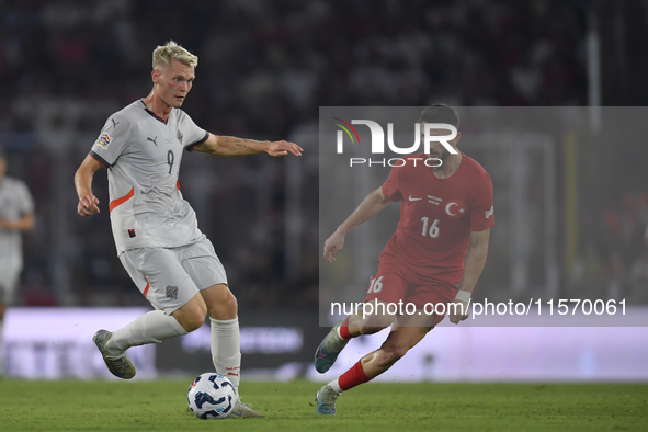 Ismail Yuksek of Turkey and Orri Oskarsson of Iceland  during the UEFA Nations League 2024/25 League B Group B4 match between Turkiye and Ic...