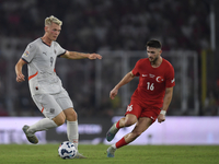 Ismail Yuksek of Turkey and Orri Oskarsson of Iceland  during the UEFA Nations League 2024/25 League B Group B4 match between Turkiye and Ic...