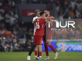 Merih Demiral and Ismail Yuksek of Turkey  during the UEFA Nations League 2024/25 League B Group B4 match between Turkiye and Iceland at Gür...