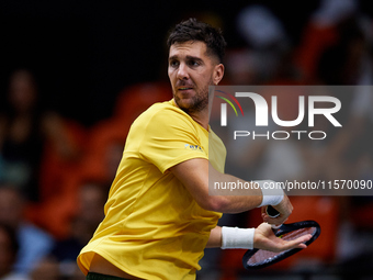 Thanasi Kokkinakis of Australia is in action during the game against Jakub Mensik of Czechia during the 2024 Davis Cup Group B Stage match b...