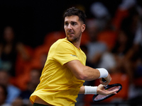 Thanasi Kokkinakis of Australia is in action during the game against Jakub Mensik of Czechia during the 2024 Davis Cup Group B Stage match b...