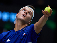 Jakub Mensik of Czechia serves during the game against Thanasi Kokkinakis of Australia during the 2024 Davis Cup Group B Stage match between...