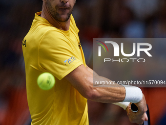 Thanasi Kokkinakis of Australia is in action during the game against Jakub Mensik of Czechia during the 2024 Davis Cup Group B Stage match b...