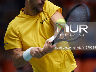 Thanasi Kokkinakis of Australia is in action during the game against Jakub Mensik of Czechia during the 2024 Davis Cup Group B Stage match b...