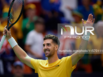 Thanasi Kokkinakis of Australia celebrates the victory following the game against Jakub Mensik of Czechia during the 2024 Davis Cup Group B...