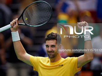 Thanasi Kokkinakis of Australia celebrates the victory following the game against Jakub Mensik of Czechia during the 2024 Davis Cup Group B...