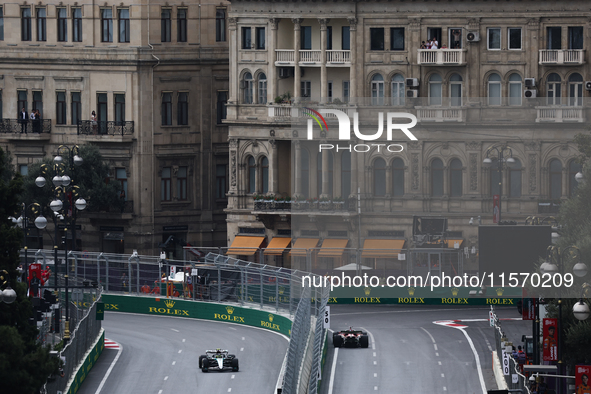 Lewis Hamilton of Mercedes and Charles Leclerc of Ferrari during first practice ahead of the Formula 1 Grand Prix of Azerbaijan at Baku City...