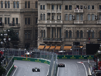 Lewis Hamilton of Mercedes and Charles Leclerc of Ferrari during first practice ahead of the Formula 1 Grand Prix of Azerbaijan at Baku City...