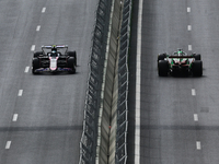 Pierre Gasly of Alpine and Valtteri Bottas of Kick Sauber during first practice ahead of the Formula 1 Grand Prix of Azerbaijan at Baku City...