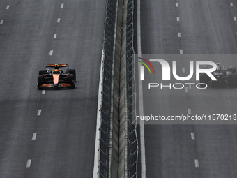 Lando Norris of McLaren and Franco Colapinto of Williams during first practice ahead of the Formula 1 Grand Prix of Azerbaijan at Baku City...