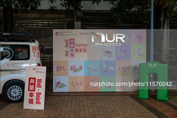 A backdrop for the Well Being Estate Festival at a public housing estate in Hong Kong on September 13, 2024. 