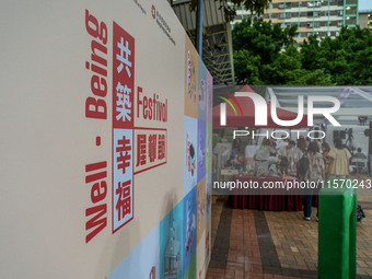 A backdrop for the Well Being Estate Festival at a public housing estate in Hong Kong on September 13, 2024. (