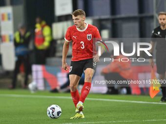 Benjamin Bockle (3 Austria) passes the ball during the International Friendly match between England Under 21s and Austria Under 21s at Kenil...