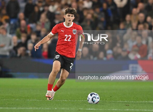 Florian Micheler (22, Austria) goes forward during the International Friendly match between England Under 21s and Austria Under 21s at Kenil...