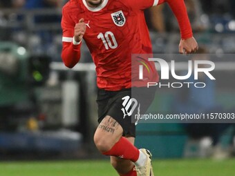 Christoph Lang (10 Austria) goes forward during the International Friendly match between England Under 21s and Austria Under 21s at Kenilwor...