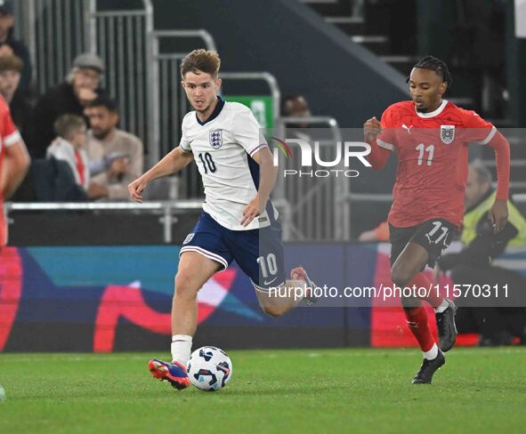 James McAtee (10 England) goes forward during the International Friendly match between England Under 21s and Austria Under 21s at Kenilworth...