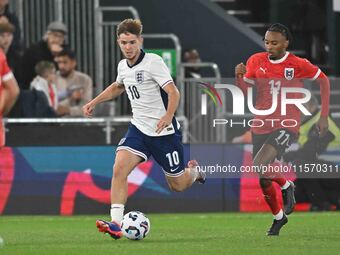 James McAtee (10 England) goes forward during the International Friendly match between England Under 21s and Austria Under 21s at Kenilworth...