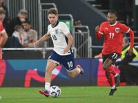 James McAtee (10 England) goes forward during the International Friendly match between England Under 21s and Austria Under 21s at Kenilworth...