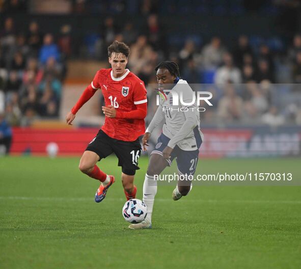 Jamie Bynoe-Gittens (21, England) is challenged by Nikolas Sattlberger (16, Austria) during the International Friendly match between England...