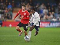 Jamie Bynoe-Gittens (21, England) is challenged by Nikolas Sattlberger (16, Austria) during the International Friendly match between England...