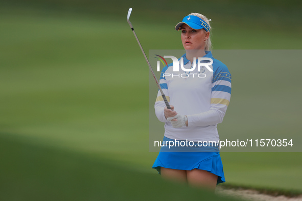 GAINESVILLE, VIRGINIA - SEPTEMBER 13: Charley Hull of of Team Europe lines up her bunker shot to the 7th green during Day One of the Solheim...