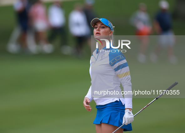 GAINESVILLE, VIRGINIA - SEPTEMBER 13: Charley Hull of of Team Europe follows her bunker shot to the 7th green during Day One of the Solheim...