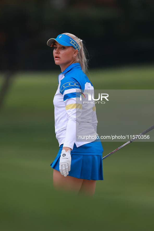 GAINESVILLE, VIRGINIA - SEPTEMBER 13: Charley Hull of of Team Europe follows her bunker shot to the 7th green during Day One of the Solheim...