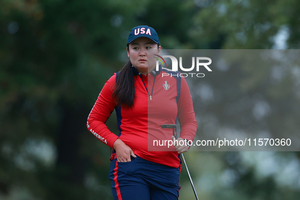 GAINESVILLE, VIRGINIA - SEPTEMBER 13: Allisen Corpuz of the United States walks on the seventh green during Day One of the Solheim Cup at Ro...