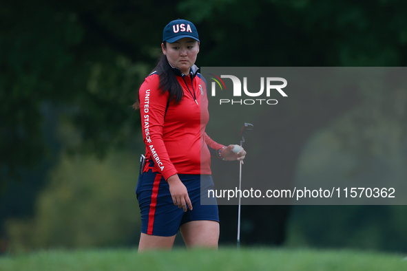 GAINESVILLE, VIRGINIA - SEPTEMBER 13: Allisen Corpuz of the United States walks on the seventh green during Day One of the Solheim Cup at Ro...