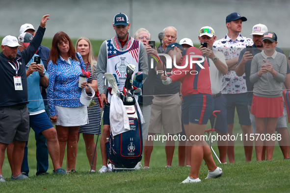 GAINESVILLE, VIRGINIA - SEPTEMBER 13: Allisen Corpuz of the United States hits to the 8th green during Day One of the Solheim Cup at Robert...