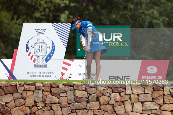 GAINESVILLE, VIRGINIA - SEPTEMBER 13: Esther Henseleit of Team Europe  hits from the 9th tee during Day One of the Solheim Cup at Robert Tre...