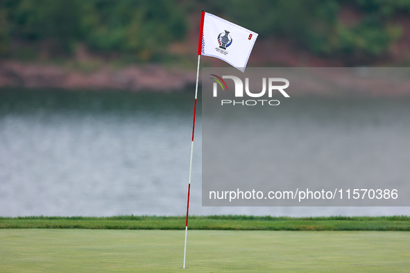 GAINESVILLE, VIRGINIA - SEPTEMBER 13: The flag for the 9th hole wafts in the breeze during Day One of the Solheim Cup at Robert Trent Jones...