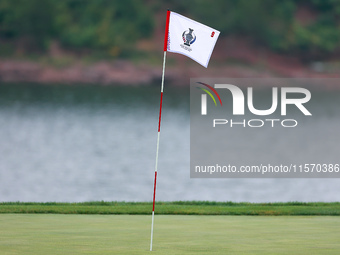 GAINESVILLE, VIRGINIA - SEPTEMBER 13: The flag for the 9th hole wafts in the breeze during Day One of the Solheim Cup at Robert Trent Jones...