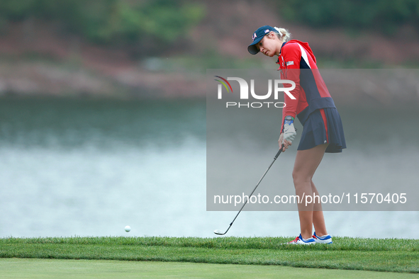 GAINESVILLE, VIRGINIA - SEPTEMBER 13: Nelly Korda of the United States chips to the 9th green during Day One of the Solheim Cup at Robert Tr...