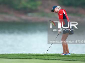 GAINESVILLE, VIRGINIA - SEPTEMBER 13: Nelly Korda of the United States chips to the 9th green during Day One of the Solheim Cup at Robert Tr...