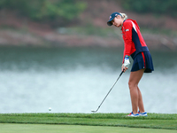 GAINESVILLE, VIRGINIA - SEPTEMBER 13: Nelly Korda of the United States chips to the 9th green during Day One of the Solheim Cup at Robert Tr...